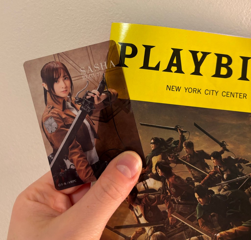 One of the trading cards from ATTACK on TITAN: The Musical depicting Sasha.